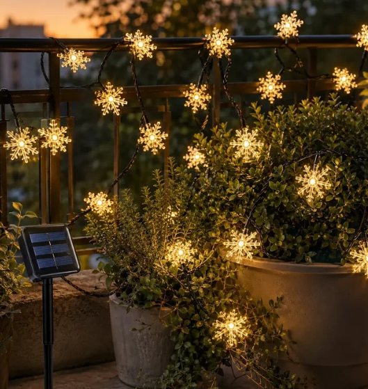 Guirnalda Solar Copos de Nieve 5 m con 20 LED Cálidos para Navidad