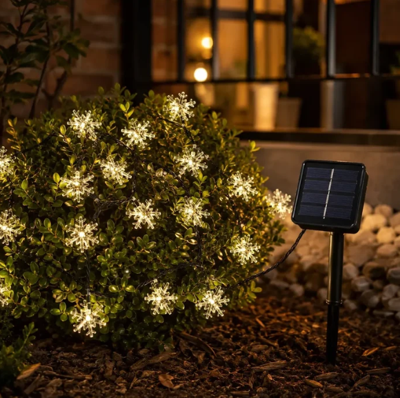 Guirnalda Solar Copos de Nieve 5 m con 20 LED Cálidos para Navidad